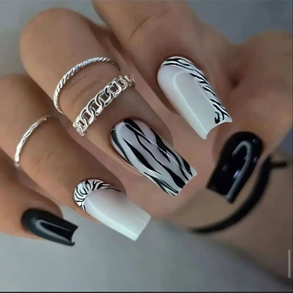   Nails with black and white design for girls