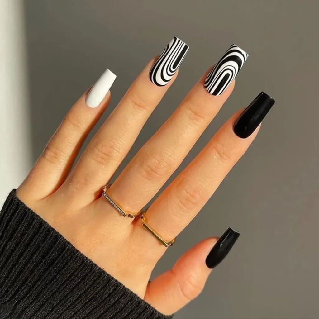   Nails with white design are more black