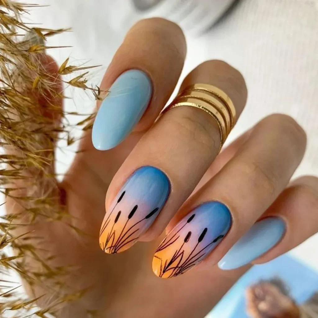 Nails with a girly landscape design