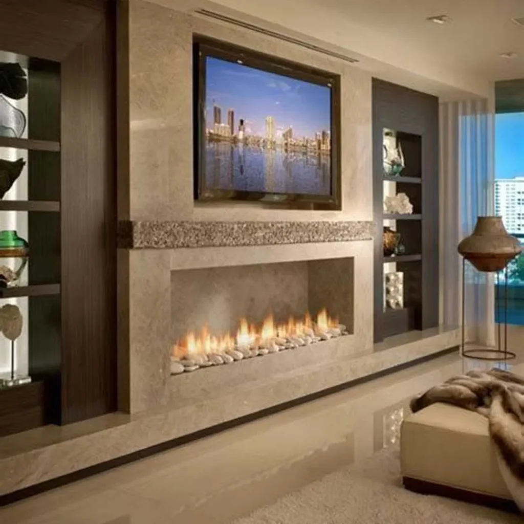 The wall behind the TV with a modern and beautiful fireplace