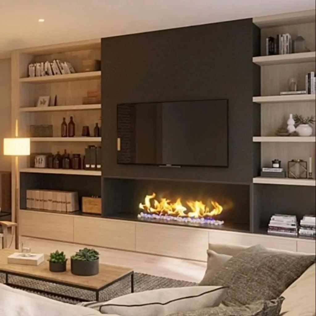 The design of the wall behind the TV with a modern fireplace 