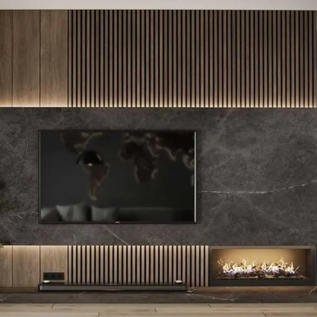 The wall behind the TV with a modern and small fireplace