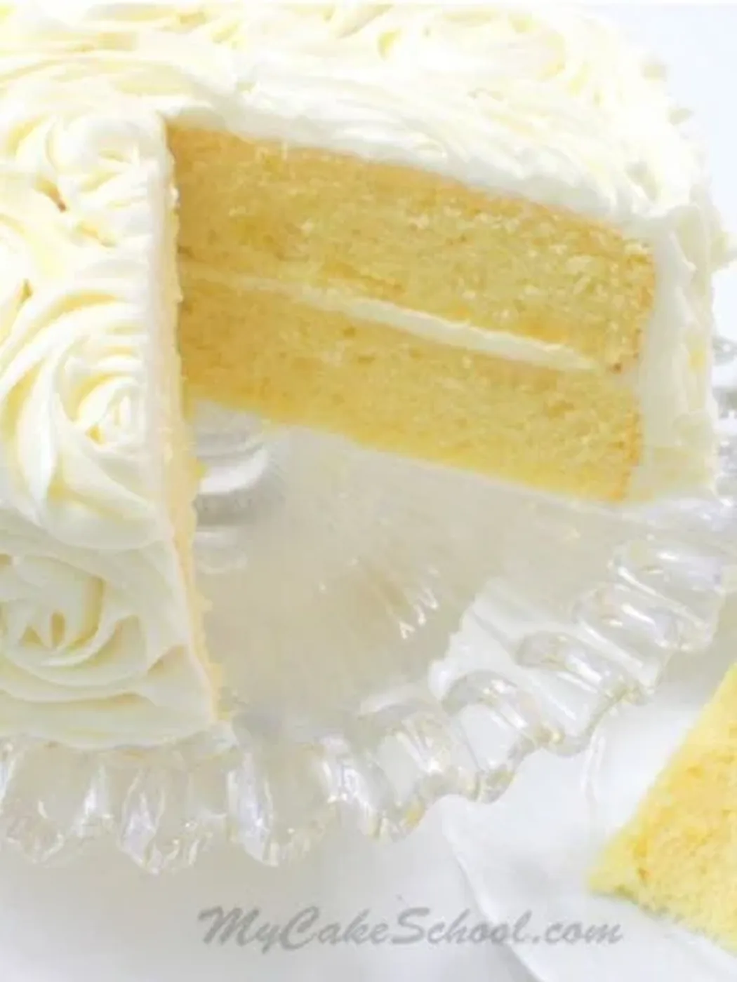 Lemon Cake from Scratch, sliced, on a cake pedestal.؛ کیک پاند بادام و Raspberry