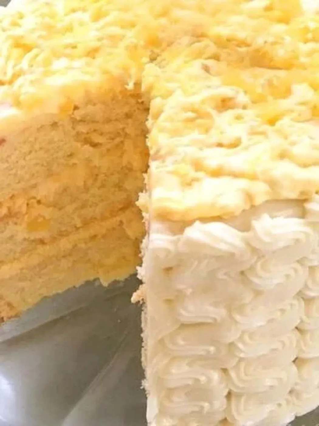 Moist Pineapple Cake, sliced, on a cake plate.؛ کیک پاند بادام و Raspberry